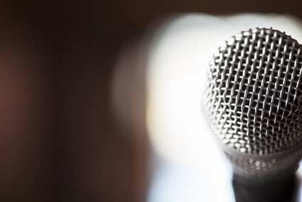 A microphone on a digital voice recorder, the input side of the device that feeds recordings to its NAND flash memory chip