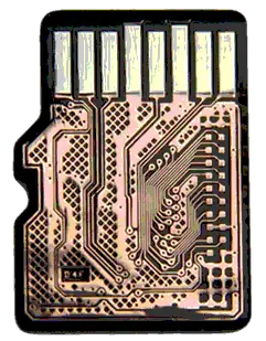 Inside a microSD card showing NAND flash memory components for digital image recovery